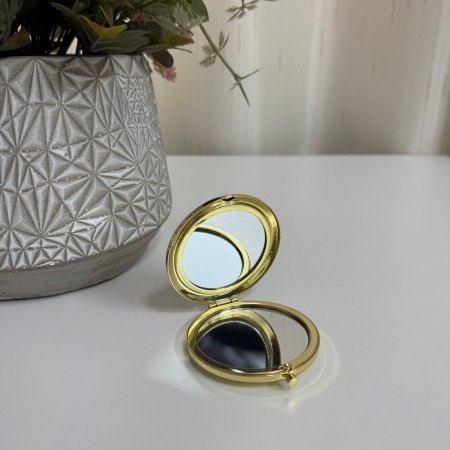 مرايا معدن ذهبي دائري