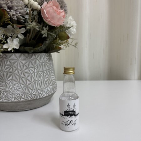 قناني ماء زمزم بلاستيك مع كتابة